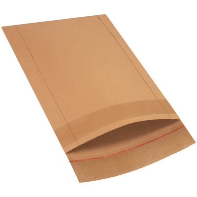 B826.jpg A brown paper bag rests flat on a white surface, similar to the 14 1/2 x 18 1/2 Lbs7 Jiffy Rigi Bag® Mailers. It opens at one end with a red sealing strip inside and has a rectangular shape with visible creases, ideal for securely packaging documents or items.