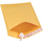 A Kraft 8 1/2 x 12 Lbs2 Self-Seal Bubble Mailer, part of a 25 pack, is shown with an open flap and bubble wrap lining, featuring a white pull tab with red text for easy sealing.