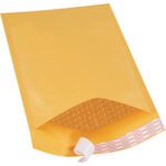 A yellow 8 1/2 x 14 1/2 Kraft bubble mailer displays its protective bubble wrap lining and features a white self-seal strip for easy closure, weighing Lbs3 and efficiently packed in a case of 70.