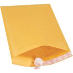 A 9 1/2 x 14 1/2 yellow Kraft Lbs4 Self-Seal Bubble Mailer from the Freight Saver Pack (70/Case) is partially opened, showcasing its bubble wrap interior against a plain white background.