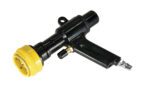 The image features the Vestil Dunnage Bag Inflation Nozzle, a black mechanical device with a yellow dial and black handle. It includes a metal connector at one end, designed for optimal use with Vestil Dunnage Bags, all on a pristine white background.