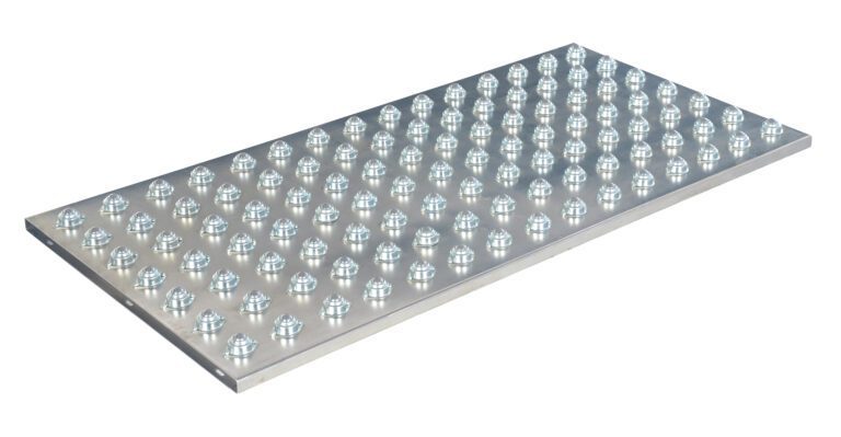 The Vestil Chrome Ball Transfer Platform 30 x 60 inches is a rectangular metal sheet with evenly spaced, round protrusions in a diagonal grid. Its chrome finish hints at durable steel or aluminum construction.