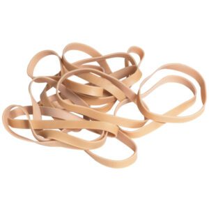 A disorganized stack of MH-USA 1/4 x 3 1/2 Rubber Bands - 5 Lb. Bulk (5 Lbs/Case) sits against a white background, with the tan, flat, and slightly twisted bands displaying their elasticity.