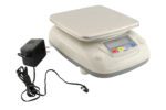 The Vestil Weighing Parts Scale, with a stainless steel platform and button control panel, includes a detachable power adapter and has a 26 lb capacity for precise measurements.