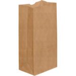 A plain Kraft Grocery Bag, size 7 1/8 x 4 1/2 x 13 3/4, with a flat bottom and visible creases, stands upright on a white background. Its closed at the top, empty and unused, part of a convenient bundle of 500 for grocery needs.