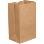 Against a white background, a plain 12 x 7 x 17 Kraft grocery bag with a rectangular base is displayed upright. It features crisp edges and appears empty. This bag is part of the 12 x 7 x 17 Kraft Grocery Bags (500/Bundle) set.