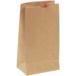 A plain brown 5 x 3 1/4 x 9 3/4 Kraft Hardware Bag from the (400/Bundle) set stands upright against a white background. With its rectangular base, creased sides, and scalloped top edge, its ideal for lunch or small groceries.