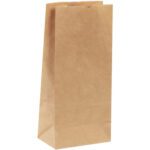 An 8 1/4 x 5 1/4 x 18 Kraft hardware bag stands upright on a white background. The plain brown bag with a rectangular base and open top is perfect for carrying groceries or lunches. Available in bundles of 400.
