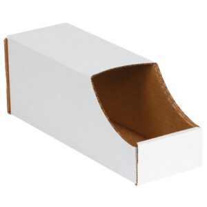 The white corrugated cardboard magazine holder, similar to the MH-USA stackable bin boxes, features an open semi-circular cutout on one side, showing a contrasting brown interior.