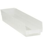 The transparent, rectangular plastic storage bin with raised edges and an open top is perfect for organizing. Its frosted finish adds a slightly opaque look, modeled after the MH-USA 23 5/8 x 4 1/8 x 4 Clear Plastic Shelf Bin Boxes for practical style in any space.
