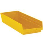 The MH-USA Yellow Plastic Shelf Bin Boxes (23 5/8 x 8 3/8 x 4, set of six) have an open front and slanted sides, making their rectangular shape and smooth surface ideal for organizing tools or small items in a spacious interior.
