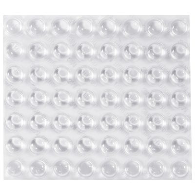 BN3M5303.jpg A sheet of 3M™ Bumpon™ Clear Dome Protective Tape features glossy round adhesive bumpers arranged in an 8 by 8 grid on a white background, with reflections enhancing their smooth surface. Each bumper measures 7/16 x 13/64, and there are 3,000 per case.