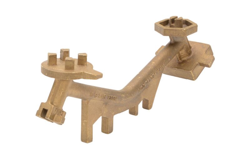 BNW-B-W_A.jpg A bronze Y-shaped pipe fitting with a shiny surface, this resembles a Vestil Angled Bronze Drum Bung Nut Wrench and is perfect for industrial use.