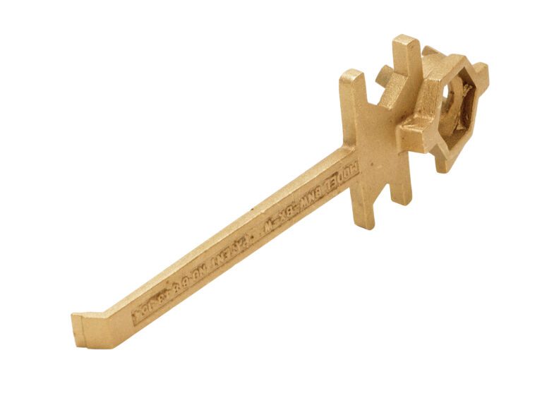 BNW-BX-W_A.jpg The Vestil Straight Bronze Drum Bung Nut Wrench has a hexagonal socket on one end and protruding notches on the other, likely for specialized mechanical use, with engraving on its shaft.