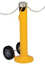 The Vestil Movable Bollard W/ Slots 42X5.5 features a yellow portable barrier post with a top chain and two wheels for easy mobility, topped by a silver cap and adorned with black diagonal stripes, perfect for versatile positioning.