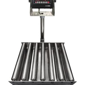 The Vestil Bench Scale SS Tray Roll Top 24x24 1000 includes a digital display with red numbers and multiple control buttons. It has a platform of parallel metal rollers for weighing large objects, with the display mounted on a vertical stand attached to the base.