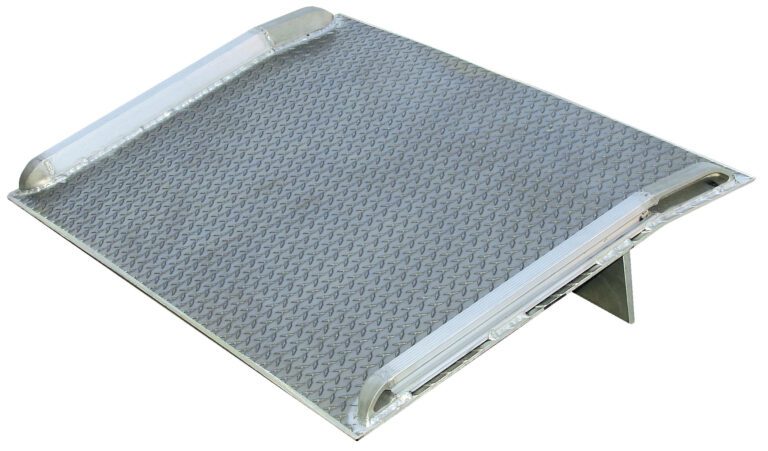 The Vestil Aluminum Truck Dockboard 8000 Lbs 54X66 offers stability with a diamond plate surface and raised edges and has a sturdy stand that ensures secure positioning with a slight incline.