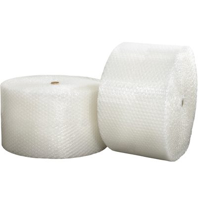 BWHD12S24.jpg Two large MH-USA 1/2 x 24 x 250 (2) Strong Grade Air Bubble Rolls stand upright against a white background. Their textured surfaces with visible bubbles ensure optimal packing and protection for shipping, offering reliability at 250 feet per roll.