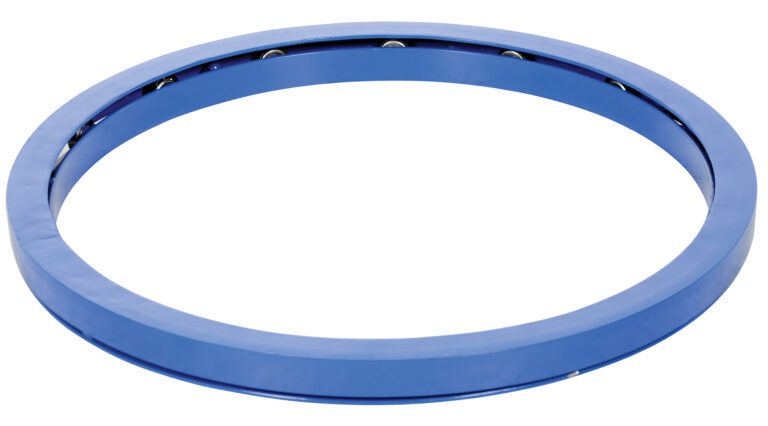 CA-24-2_A.jpg A blue circular metal bearing, similar to the Vestil Manual Carousel 2000 Lb Capacity 24 In, shows visible ball bearings around its inner edge. Designed for smooth rotation, it is displayed against a white backdrop.