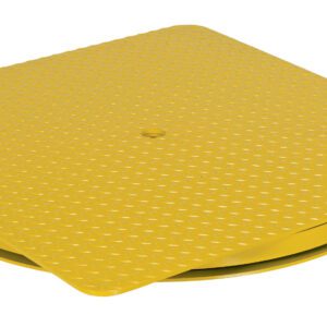 A textured yellow square platform with a central hole, similar to the Vestil HD King Pin Carousel 6000 lb 36W x 36L, rests on a circular base. Its metal surface features a diamond plate pattern, suggesting it is part of industrial equipment like a rotating palette.