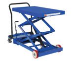The Vestil Premium Double Scissor Cart 1K 24 X 40.5 is a blue hydraulic lift with a flat platform and red wheels, equipped with a handle for easy maneuvering and a foot pedal for lifting, ideal for transporting heavy items efficiently.