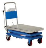 The Vestil Scissor Cart With Built In Scale boasts a blue hydraulic lift table cart, a silver platform, four red caster wheels, and a manual lever. It features an ergonomic handlebar and raised backplate for industrial use, with a visible warning label on the side.