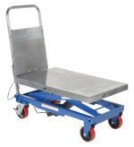 The Vestil Linear Actuated Elevating Cart 500 Lb is a metal platform lift on wheels with a blue frame and red casters, designed for smooth transport of heavy items. It features a steel surface and vertical handle for easy maneuvering.