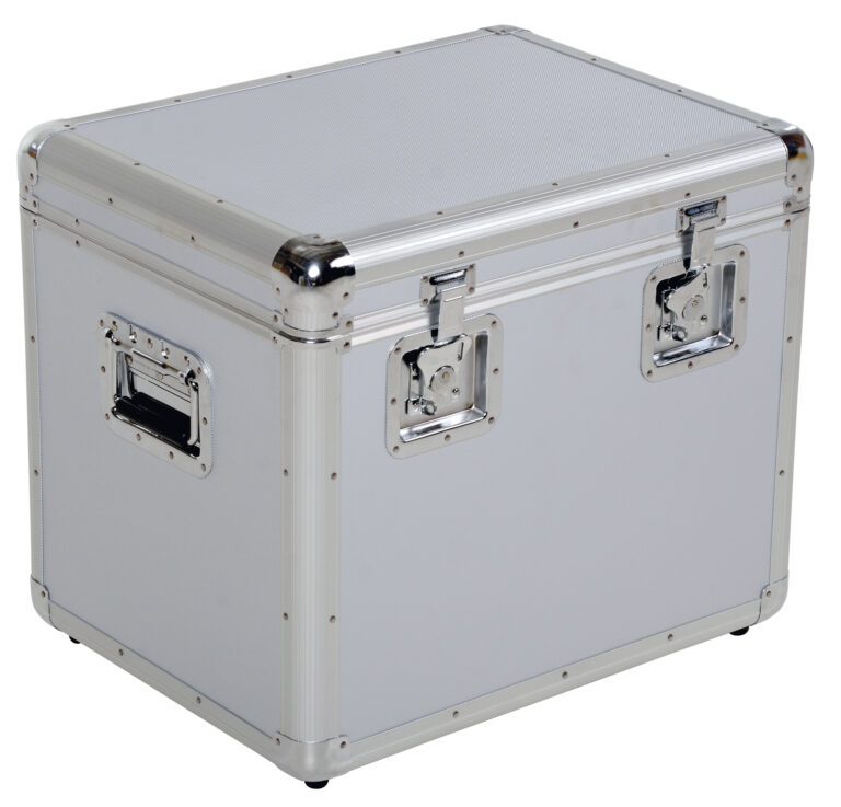 CASE-M_A.jpg The Vestil Medium Aluminum Case 16.15X21.5X19.15 is a robust, industrial storage box with a light grey body, shiny metal edges, two front clasps, and a side handle, all bounding its rectangular form with the lid closed.