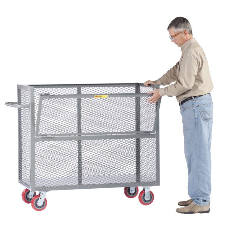 A man in safety glasses, a beige shirt, and jeans is pushing a Little Giant Welded Drop-Gate Truck. It has red wheels, a large gray metal mesh design, and a handle. He stands on the right side of the cart.