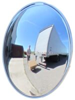In a clear blue sky reflection, a fisheye scene shows a man moving a cardboard box on a dolly by a large truck. This is perfectly captured by the Vestil Convex Mirror Indoor 25-30 Ft 5 In Deep, providing excellent visibility.