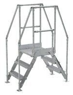 The Vestil Galvanized Cross-Over Ladder 54.5x72.15 inches includes a robust metal design, railings, an elevated platform, and three steps on each side for secure climbing and easy access to elevated areas.