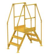 The Vestil Cross-Over Ladder 3 Step 28 H 14 W In is a durable yellow metal platform with three steps per side, measuring 28 inches high and 14 inches wide. Equipped with safety railings, it is designed for industrial or construction use.
