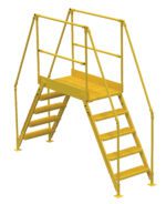 The Vestil Cross-Over Ladder 5 Step features a yellow metal design with handrails for safety, a grated platform for secure footing, and measures 48 inches high by 38 inches wide, making it ideal for stepping over obstacles easily.