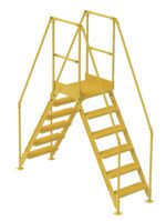 The Vestil Cross-Over Ladder 6 Step, measuring 58 inches high and 14 inches wide, is a robust structure with yellow metal safety stairs and railings, featuring two sets of steps converging at a central platform. It is expertly designed for industrial or construction use.
