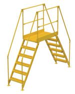 The Vestil Cross-Over Ladder has a yellow metal design with dual staircases leading to an elevated platform. Safety railings enhance security, and the freestanding structure measures 58 inches high by 38 inches wide.