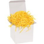 A white gift box partially open shows off a generous amount of MH-USA 10 lb. Yellow Crinkle Paper (10 Lbs/Case), whose vibrant color contrasts beautifully with the boxs simple design, creating an inviting and cheerful presentation.