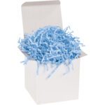 An open white gift box filled with MH-USA 10 lb. Light Blue Crinkle Paper (10 Lbs/Case) offers a textured and vibrant look. The square boxs overflowing shreds add a playful, festive touch to any display.