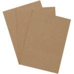 Three sheets of MH-USA 5 x 7 chipboard pads, similar to brown kraft paper, overlap in a fan-like pattern on a white background. The textured surface and earthy color enhance their appeal.