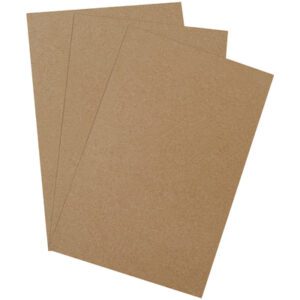 Three sheets of brown cardstock paper, fanned out slightly against a white backdrop, evoke the robust elegance of MH-USA 11 x 17 Heavy-Duty Chipboard Pads (375 Pads/Case).
