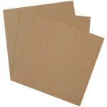 Resembling the texture and durability of MH-USA 12 x 12 Heavy-Duty Chipboard Pads (490 Pads/Case), three overlapping sheets of brown craft paper are fanned out against a simple backdrop.
