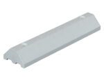 The Vestil Parking Block 24 In White is a white, rectangular, wedge-shaped plastic block with two circular mounting holes at the ends. Its slightly beveled edges provide both practicality and a modern look.