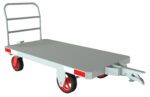 The Vestil Caster Steer Towable Trailer 96 In 3K Lb features a sturdy metal frame with four red wheels, a push handle, and a hitch for towing. Its designed to transport heavy items up to 3,000 pounds along its 96-inch length.