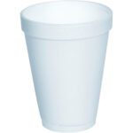 The MH-USA Foam Cups - 10 oz. (1000/Case) have a plain white, smooth cylindrical form, gently tapering at the base with an indented rim near the top, offering a simple yet practical design that is highlighted by their blank background.