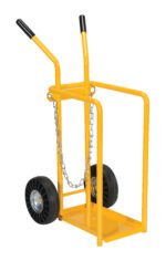 The Vestil Cylinder Tilt Back Hand Truck 150 Lb moves heavy items with a yellow frame, two black wheels, a metal base, and two handles with black grips. A front chain secures loads up to 150 lbs efficiently.