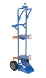 The Vestil Cylinder Tilt Back Hand Trk Overhead Lift 150 # in blue offers two wheels and a strong platform for moving heavy loads up to 150 lbs. Its sturdy frame, extending handle, and two orange straps ensure secure and efficient maneuverability.