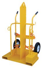 The Vestil Foam Filled-Fire Proof Torch Cart 500 Lb is a durable hand truck ideal for bulky items. It features a yellow frame, rubber tires, straps for security, and dual handles on a reinforced rectangular base to ensure stability and durability.