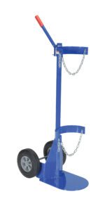 The blue Vestil Cylinder Dolly With Hard Rubber Wheels is a hand truck designed for gas cylinders, featuring two large wheels, a red handle, and metal chains to secure your items.