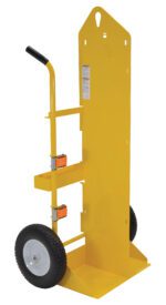 A yellow hand truck with two black handles and sturdy wheels, featuring a tall, flat back with small cutouts and a wide base for load support, resembles the design of the Vestil Torch Cart-Lift Eye-Foamed Filled 66.375In.