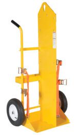 The Vestil Torch Cart-Lift Eye-Fire Proof 66.375In is a yellow hand truck with large black wheels, a tall back, and heavy-duty design. It includes side handles, two orange securing straps, and a wide base for moving bulky items efficiently.
