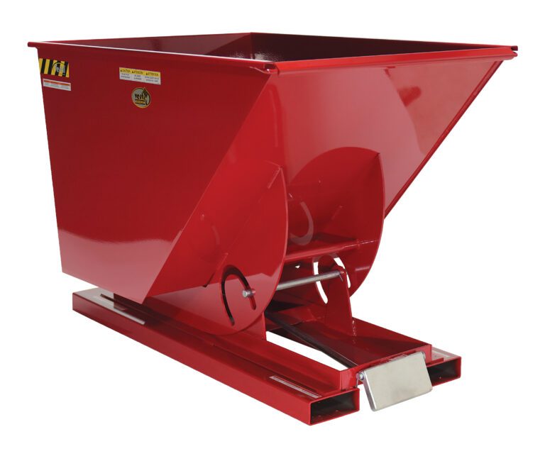 The Vestil Self-Dump Hopper Md 1 Cu Yd 4K Lb Red features a sleek angular red design with a rectangular base and large trapezoidal container. It has a tilting mechanism, safety labels, and an accessible release lever for easy unloading.